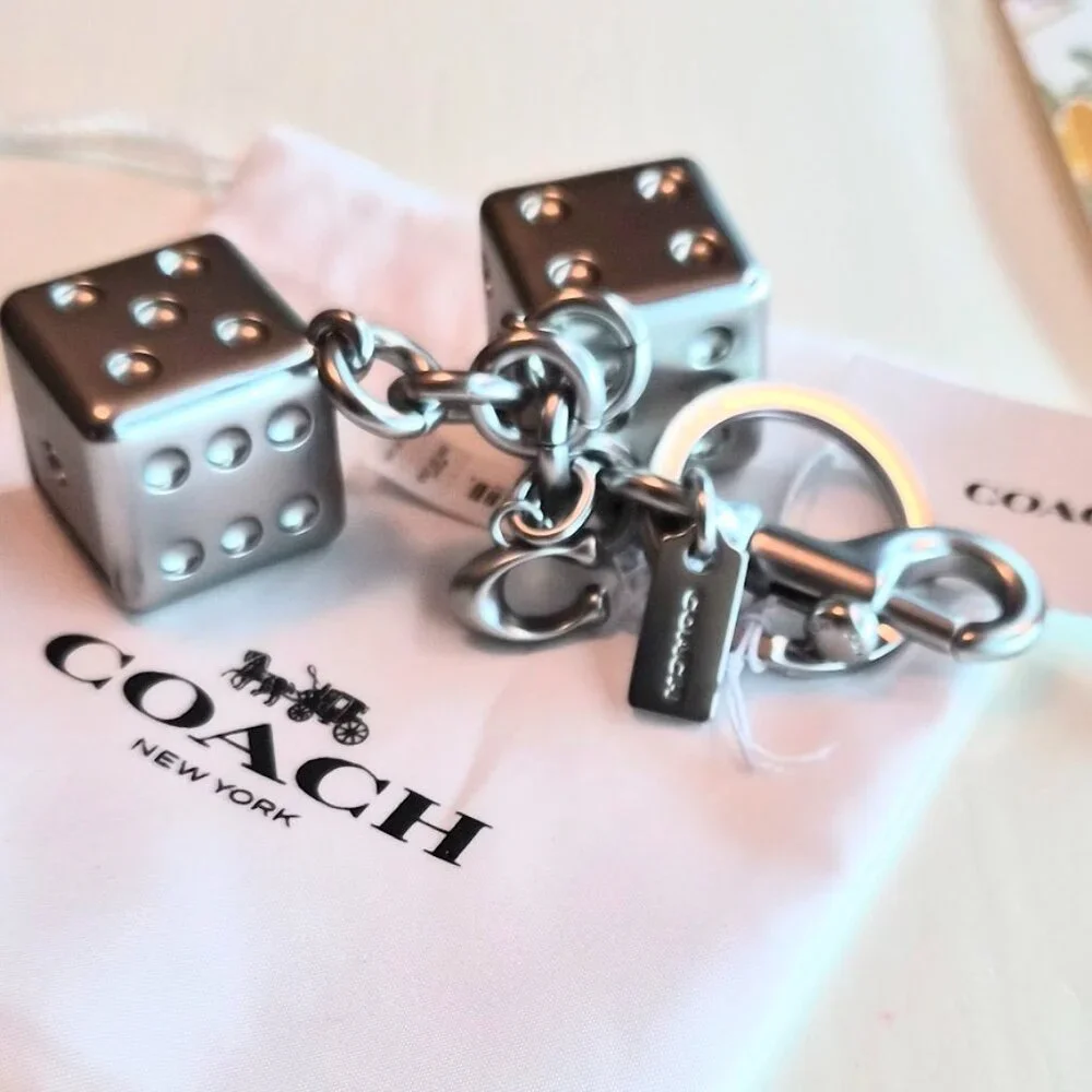 Coach Dice Bag Charm #CZ128 purchase comes with Coach dust bag